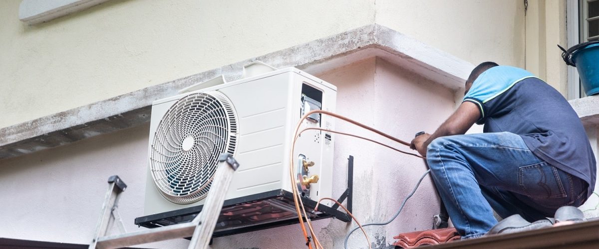 technician-installing-outdoor-air-conditioner-comp-2022-02-05-12-50-04-utc-min.jpg